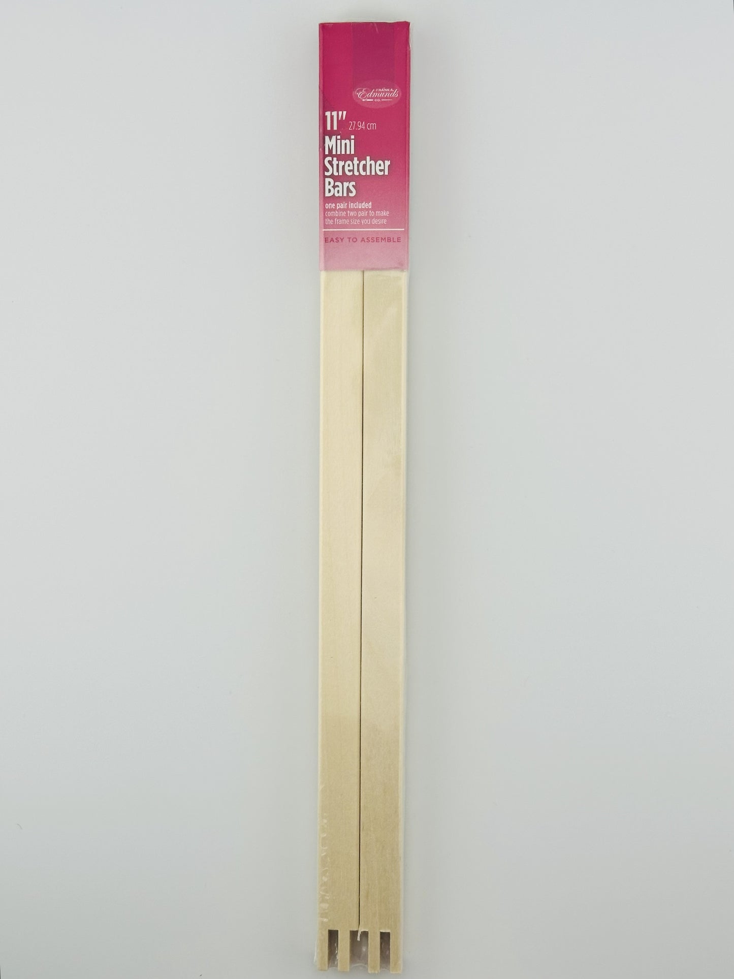 Two 11" wooden mini stretcher bars with a pink packaging label on a white background