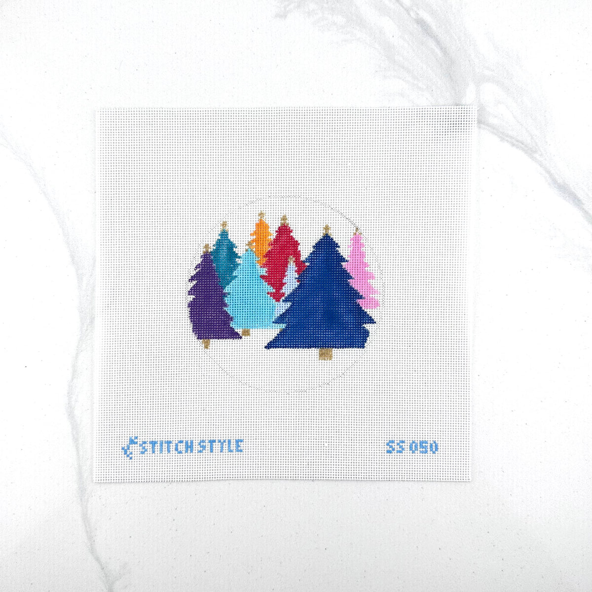 18 mesh needlepoint canvas featuring a circular design of colorful Christmas trees in purple, teal, light blue, red, orange, and pink on a white mesh background. The brand name 'STITCHSTYLE' is stitched in blue at the bottom left, and the number '35050' is stitched at the bottom right.