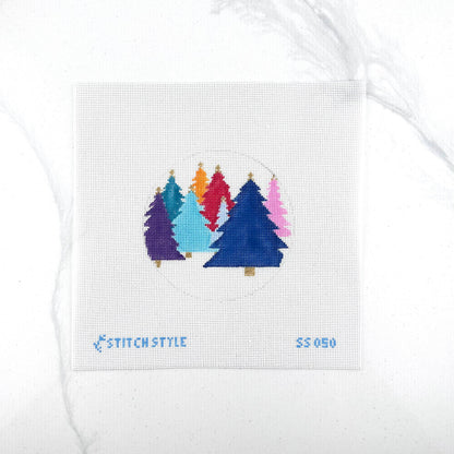 18 mesh needlepoint canvas featuring a circular design of colorful Christmas trees in purple, teal, light blue, red, orange, and pink on a white mesh background. The brand name 'STITCHSTYLE' is stitched in blue at the bottom left, and the number '35050' is stitched at the bottom right.