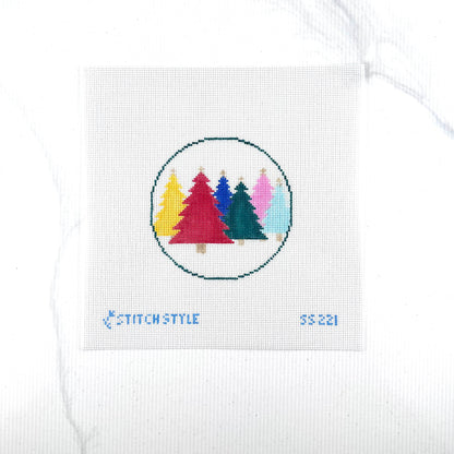 18 mesh needlepoint canvas featuring a circular design of six colorful Christmas trees in yellow, red, blue, green, pink, and light blue. The canvas has the brand name 'Stitch Style' and the number '55221' printed in blue at the bottom.