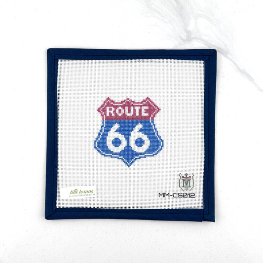 Route 66 needlepoint canvas by Misty Morrow on 18 mesh in red and blue 3" x 3" square lying flat on white background.
