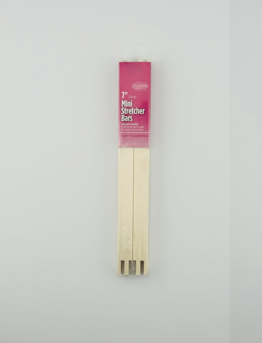 Two 7" wooden mini stretcher bars with a pink packaging label on a white background