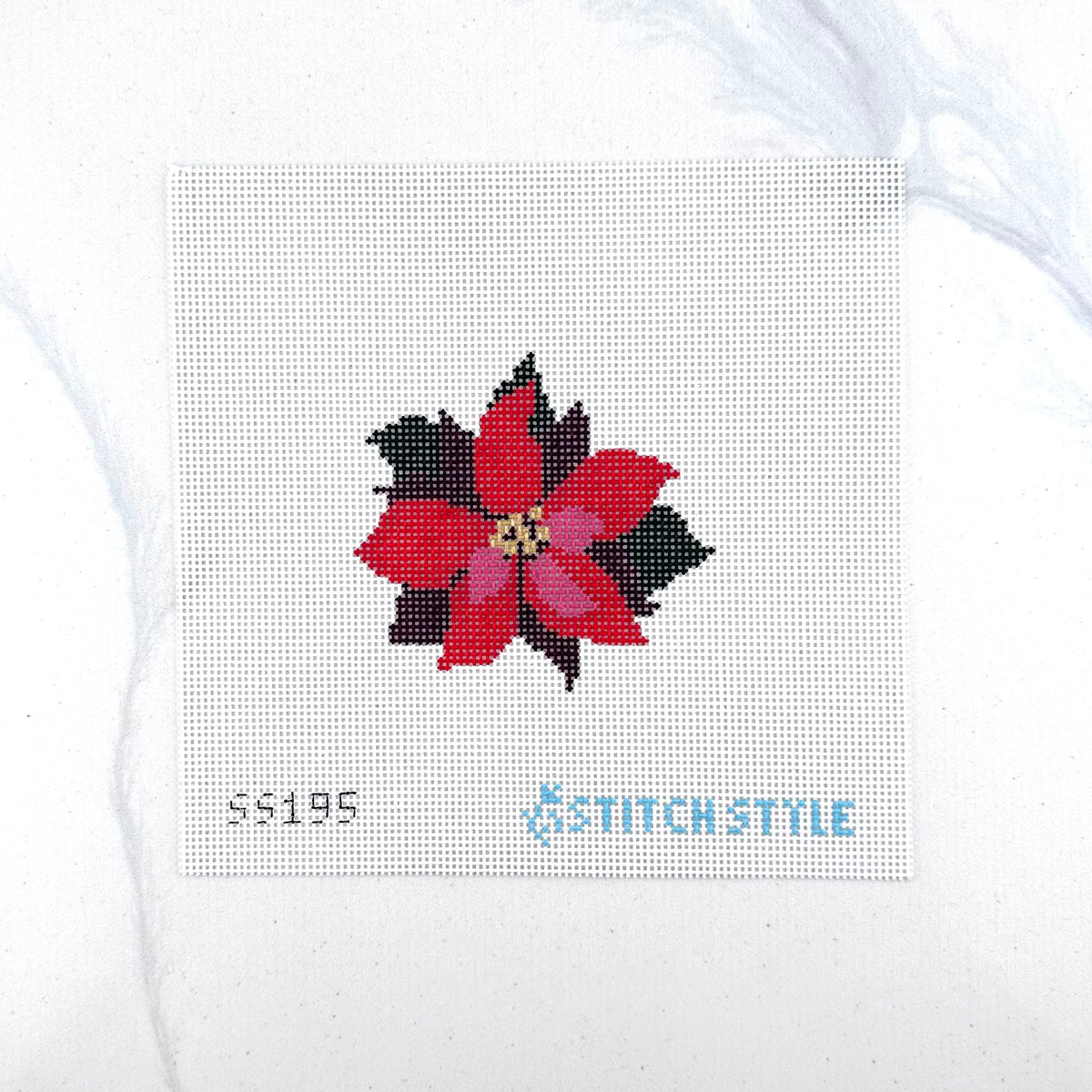 13 mesh needlepoint canvas featuring a red poinsettia flower on a white background. The text 'SS195' appears in black at the bottom left, and 'STITCH-STYLE' is printed in teal at the bottom right.