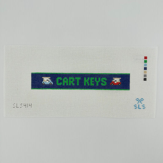 A needlepoint key fob canvas featuring a blue and green sign with the text 'CART KEYS' in green on 14 mesh lying flat on white background.