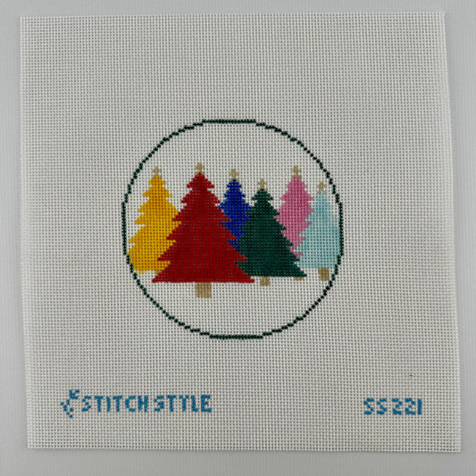 18 mesh needlepoint canvas featuring a circular design of six colorful Christmas trees in yellow, red, blue, green, pink, and light blue. The canvas has the brand name 'Stitch Style' and the number '55221' printed in blue at the bottom.