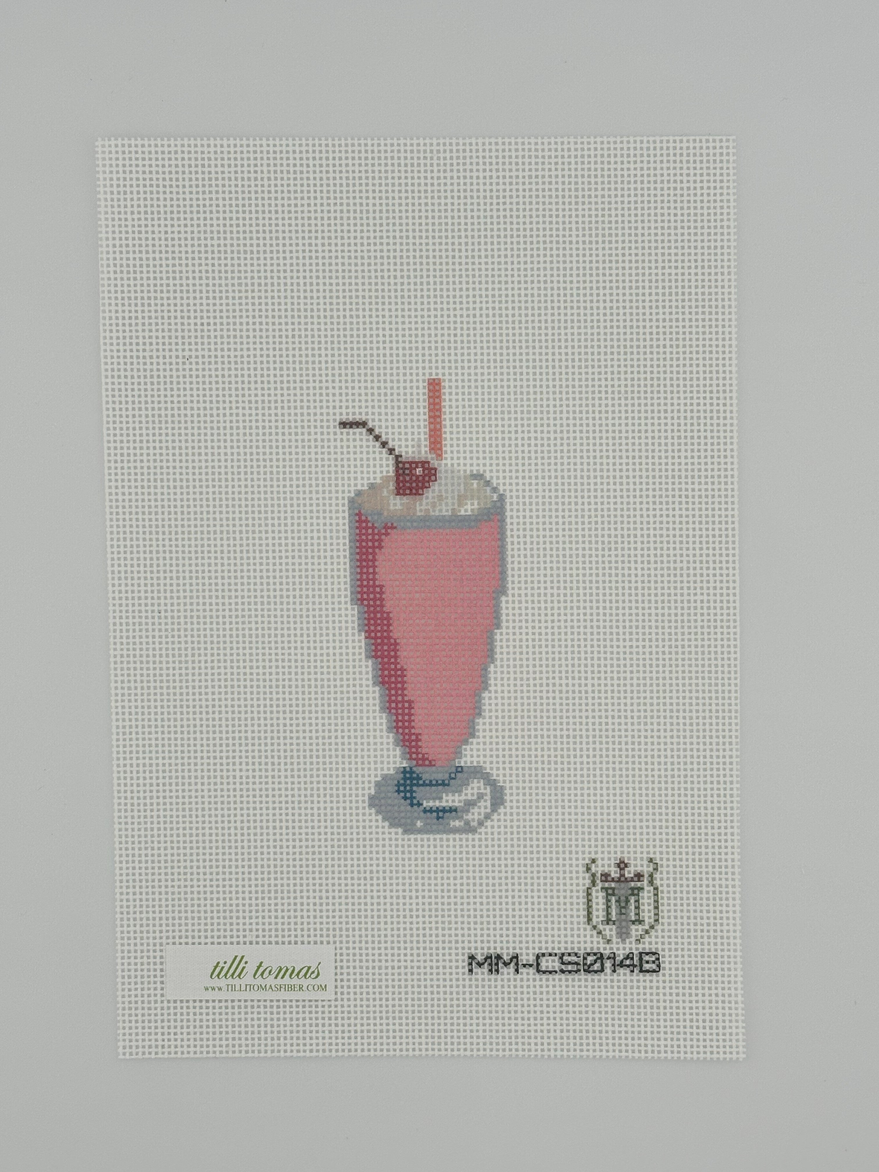 strawberry milkshake needlepoint canvas by misty morrow on 18 mesh 1.5" x4" lying flat on white background