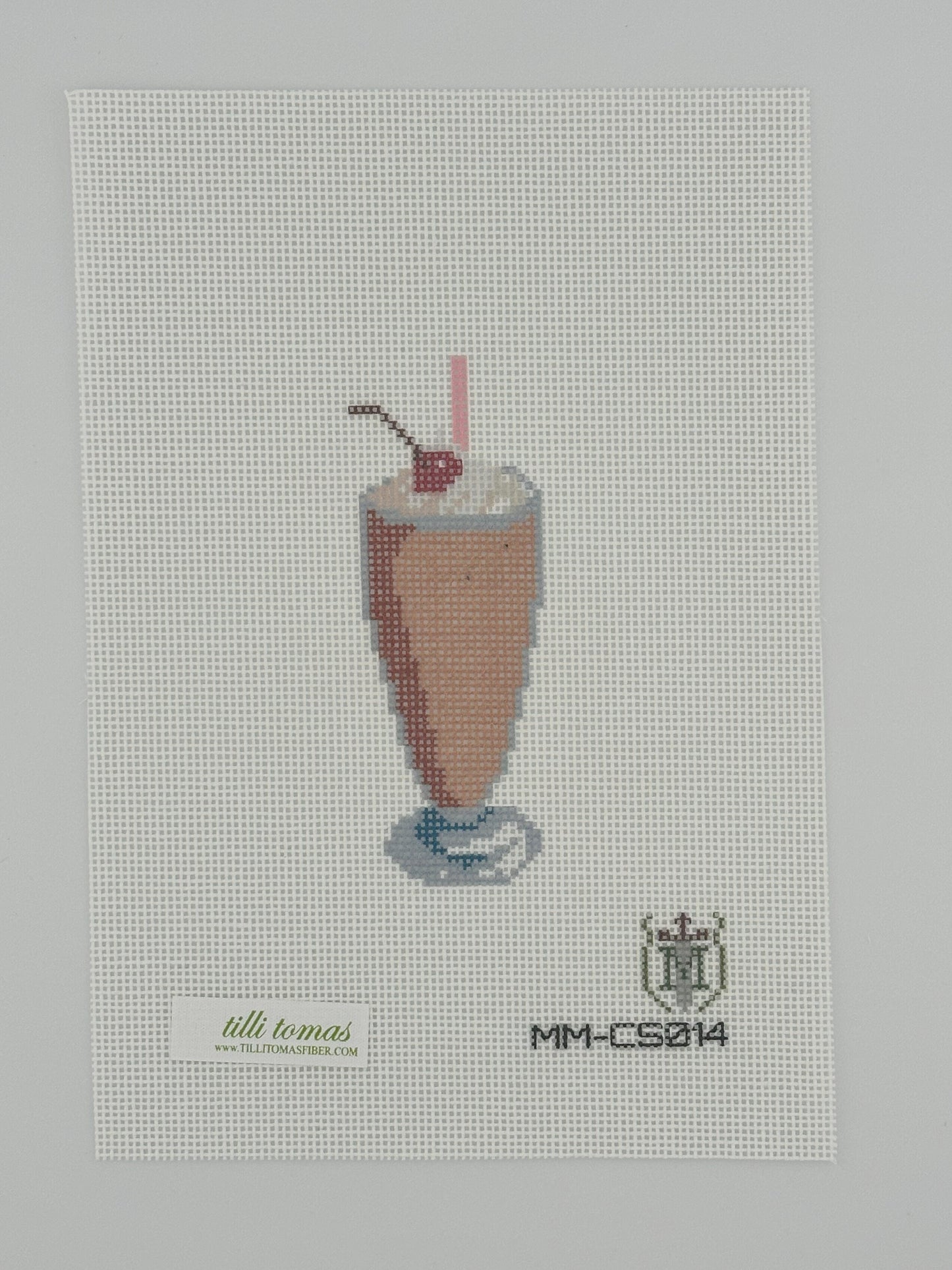 chocolate milkshake needlepoint canvas by misty morrow on 18 mesh 1.5" x4" lying flat on white background