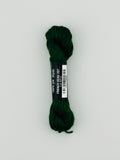 30 yard skein of Pepper Pot Silk needlepoint thread in french bean 207 green, with black and white label lying flat on white background