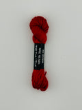 30 yard skein of Pepper Pot Silk needlepoint thread in mercury 250, with black and white label lying flat on white background