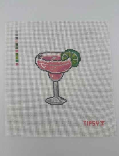 A square 18 mesh needlepoint canvas featuring a pink margarita cocktail in a glass with a lime wedge, on a white background with a small red TIPSY  text at the bottom right.
