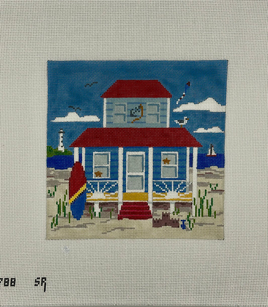susan roberts blue beach cottage needlepoint canvas, 18 mesh, square 6.25" x 6.25" lying flat on white background