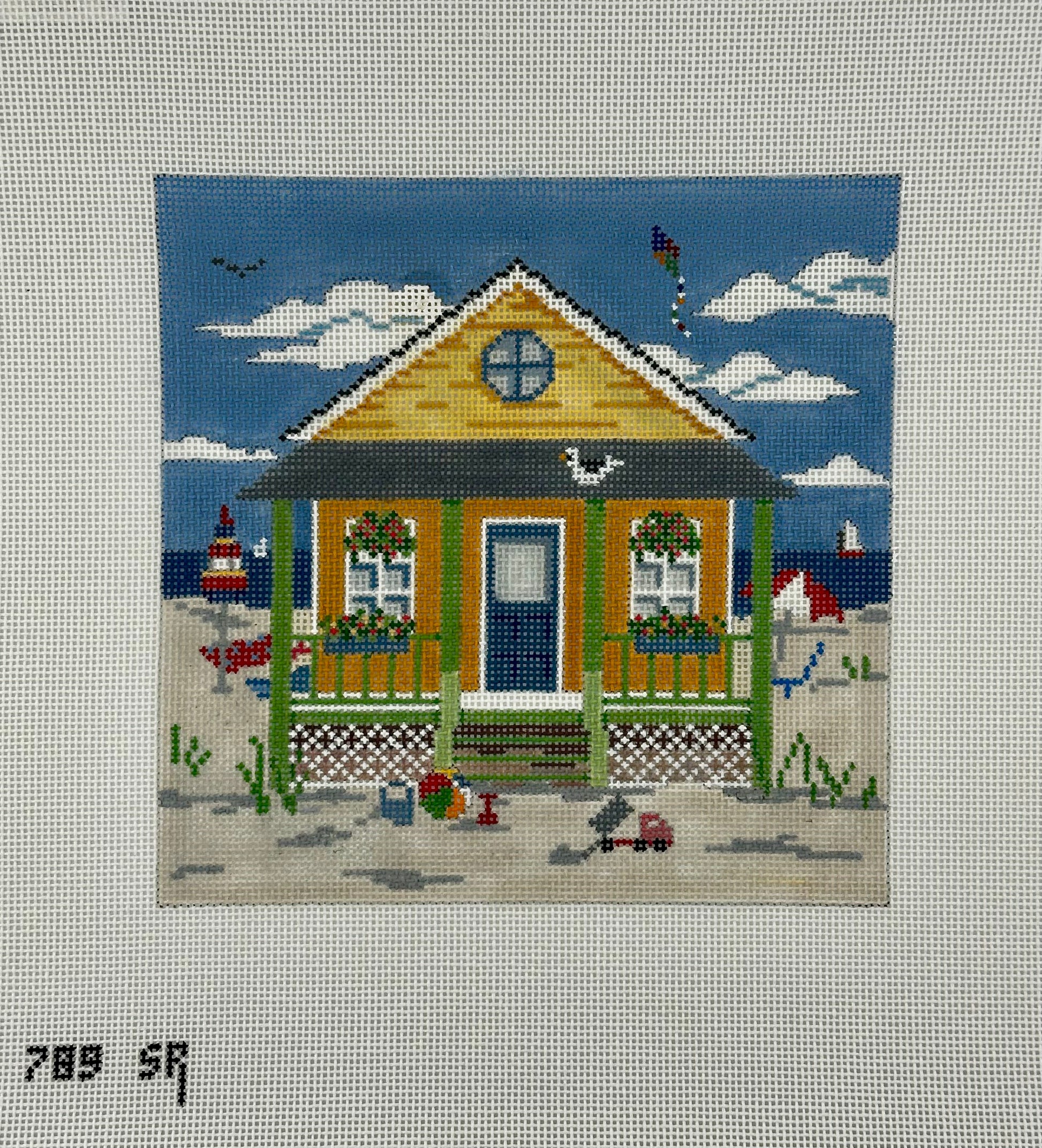 susan roberts yellow beach cottage needlepoint canvas, 18 mesh, square 6.25" x 6.25" lying flat on white background