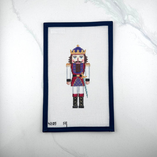 susan roberts king I nutcracker canvas, 18 mesh, 6.5" high lying flat on white background
