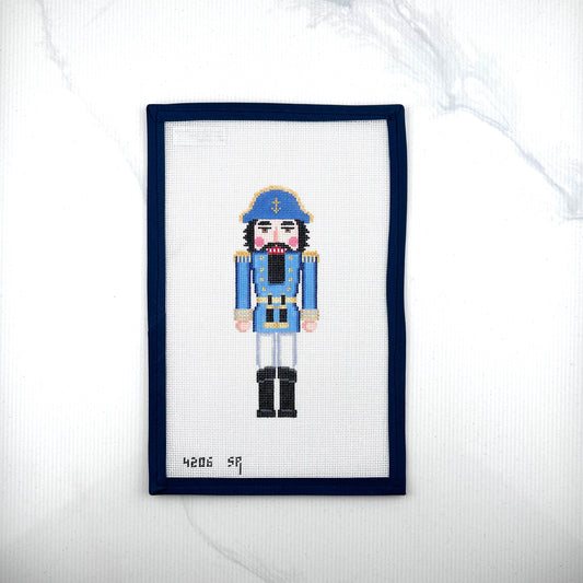 susan roberts blue sea captain nutcracker canvas, 18 mesh, 6.5" high lying flat on white background
