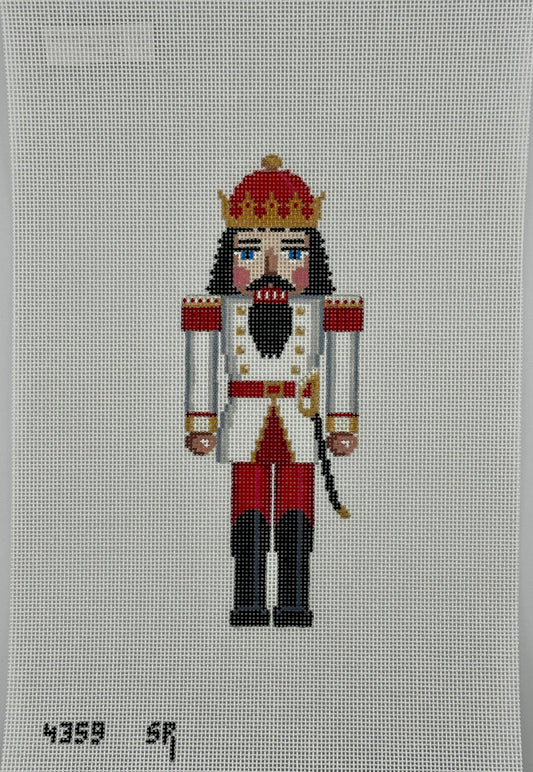 susan roberts white and red king nutcracker canvas, 18 mesh, 6.5" high lying flat on white background