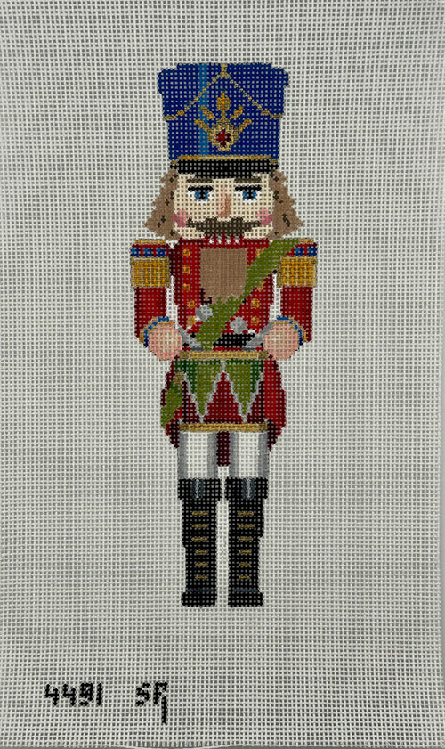 susan roberts drummer nutcracker canvas, 13 mesh, 9.5" high lying flat on white background