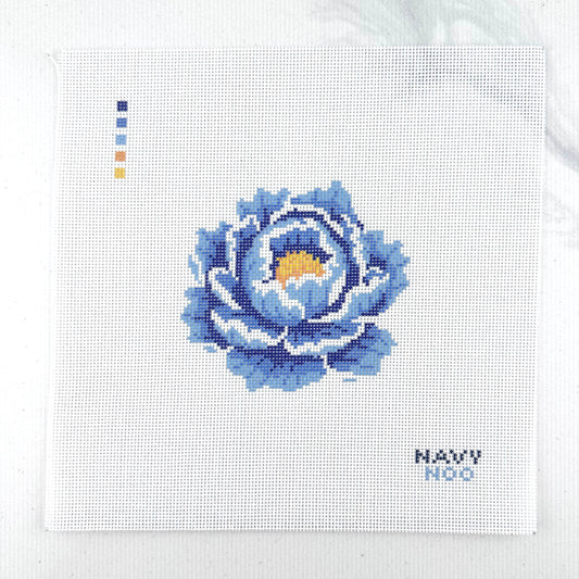 18 mesh needlepoint canvas featuring a blue peony flower with a yellow center, plus small color key squares on the left and the text 'NAVY NOO' on the bottom right, photographed on a white background.
