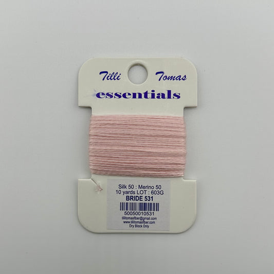 Tilli Tomas Essentials needlepoint thread, in pink bride 531.  50% silk, 50% merino wool, 10 yards wound on a white cardboard card.