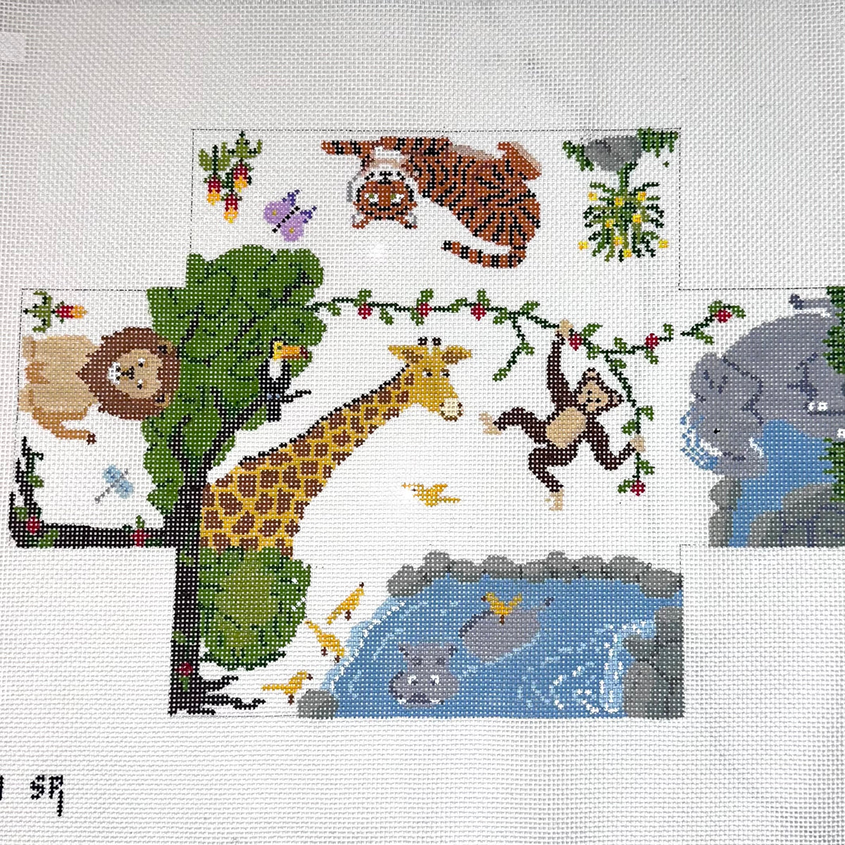 13 mesh needlepoint brick cover canvas featuring a colorful safari animal design on a white fabric background. The design includes a lion, giraffe, monkey, tiger, elephant, and a hippo in a pond.