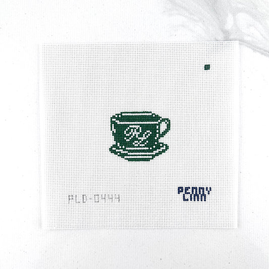 18 mesh needlepoint canvas with green mug with white accents on white background