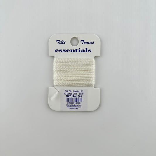 Tilli Tomas Essentials needlepoint thread, in white natural 503.  50% silk, 50% merino wool, 10 yards wound on a white cardboard card.