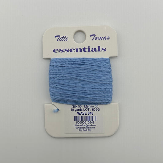 Tilli Tomas Essentials needlepoint thread, color Wave 648, a soft cornflower blue — 50% silk, 50% merino wool, 10 yards wound on a white cardboard card.